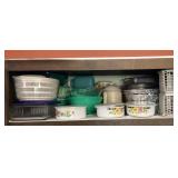 Shelf of Kitchen Goods; pans, storage containers