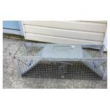Havahart live trap, 11x37x11" tall