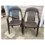 2 Brown Plastic Stacking Patio Chairs