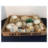 Box of misc. tea cups, kids dishes & more