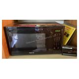 Kenmore microwave, clock & cutting boards