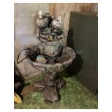 Heavy, appears to be cement, fountain with ducks