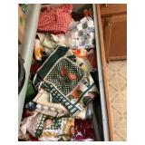 Kitchen drawer of aprons, towels & more