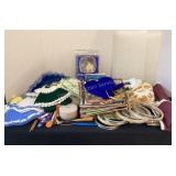 Knitting needles, hoops, books, doll clothes,