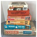6 puzzles, used