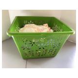 Basket of doilies, fabric pieces & more