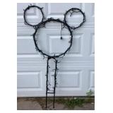 Mickey Mouse shaped yard ornament. 55't x 30.5'w,
