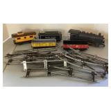 Old Marx metal train cars, engine & track