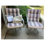 2 swivel patio chairs with cushions & covers