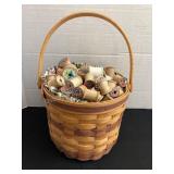 Longaberger basket full of wood spools