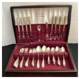 Rogerï¿½s Bros Daffodil silverware set in storage