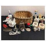 Basket of small collectibles; bells, flower
