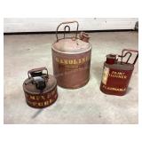 3 safety cans, some liquid