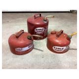 3 empty Eagle gas cans