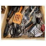 Kitchen drawer of utensils