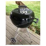 Weber charcoal grill, 18x34' tall