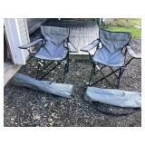 2 grey folding bag chairs