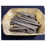 Bin of chisels & railroad spike