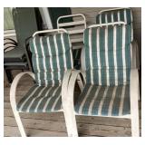 4 white stackable aluminum lounge chairs
