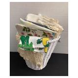 Wicker basket of linens & doilies
