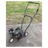 MTD gas edger, rolls over with compression