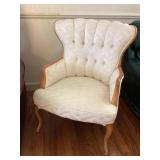 Cream high back upholstered accent chair
