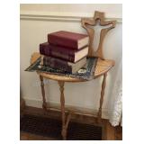 Half moon table, old books, wood plaque