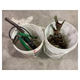 Buckets of grease guns & clamps