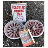 Cadillac sign, AMC hubcaps, & car restoration book