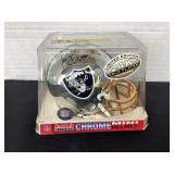 Autographed Raiders Tim Brown mini helmet