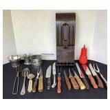 Variety of kitchen knives, Cutco holder, sifter,