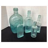 5 vintage aqua blue bottles