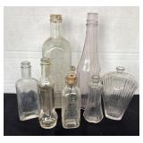 7 vintage bottles