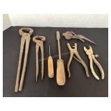 Nippers, ice pick, soldering iron, ear tag