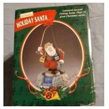 Holiday Santa - animated musical fishing Santa