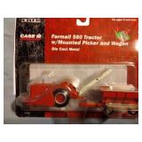 Farmall 560 tractor w/mounted picker and wagon