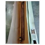 2 curtain rods and finials 48-108 in.