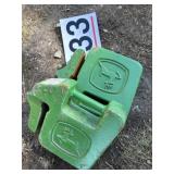 Two John Deere 40 pound weights