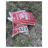 Two bags of red mulch