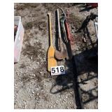 Tree, trimmer, garden tools, and oar