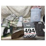 Miscellaneous new items, curtains, table cloths,