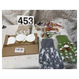 Christmas items. Utensil holder  large oven mitts