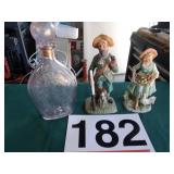 Figuines and pink tinted bottle