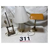 Three lamps hard plastic orange cover on desk