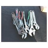 Adjustable wrenches