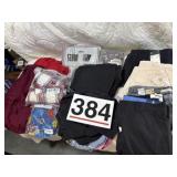 One box of all new clothes, jeans, sweaters,