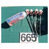 Santa light stakes and glow in the dark party