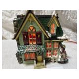 Kringle cottage at Christmas lights up works