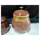 Brown stone cookie jar and pumpkin cookie jar