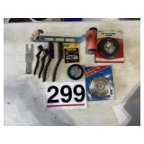 Metal brush, tape measure, and thumper